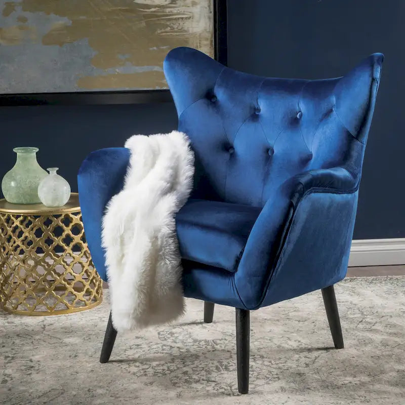 Fauteuil à oreilles en velours bleu marine 34,25
