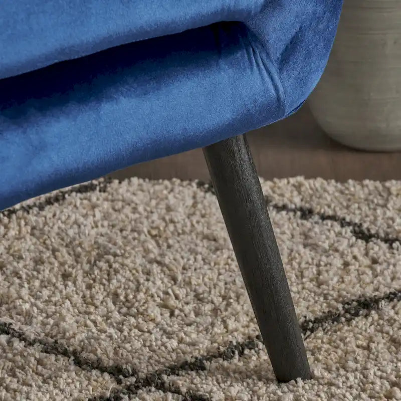 Fauteuil à oreilles en velours bleu marine 34,25
