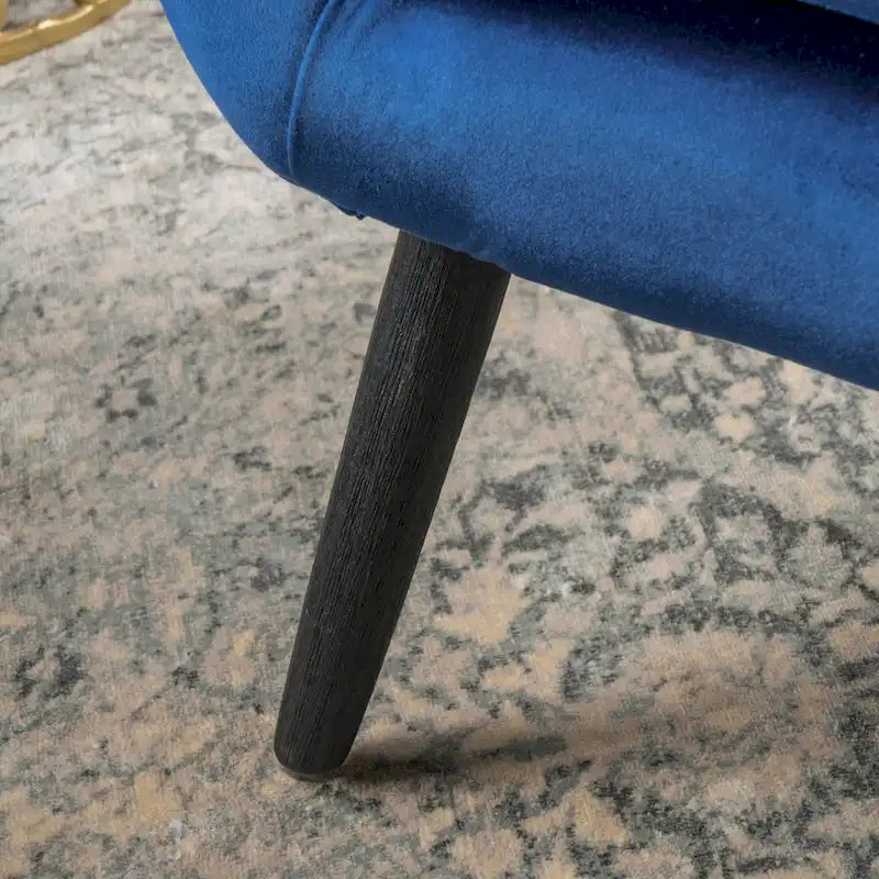 Fauteuil à oreilles en velours bleu marine 34,25