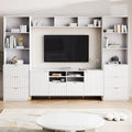 Meuble TV mural blanc de 112,5 pouces avec 13 étagères, 8 tiroirs et 2 placards pour téléviseurs jusqu'à 70 pouces.