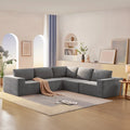 Canapé d'angle modulaire 5 places en forme de L gris 116 avec revêtement en tissu éponge moelleux pour un confort optimal dans le salon et la chambre.