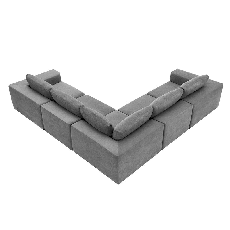 Canapé d'angle modulaire 5 places en forme de L gris 116 avec revêtement en tissu éponge moelleux pour un confort optimal dans le salon et la chambre.