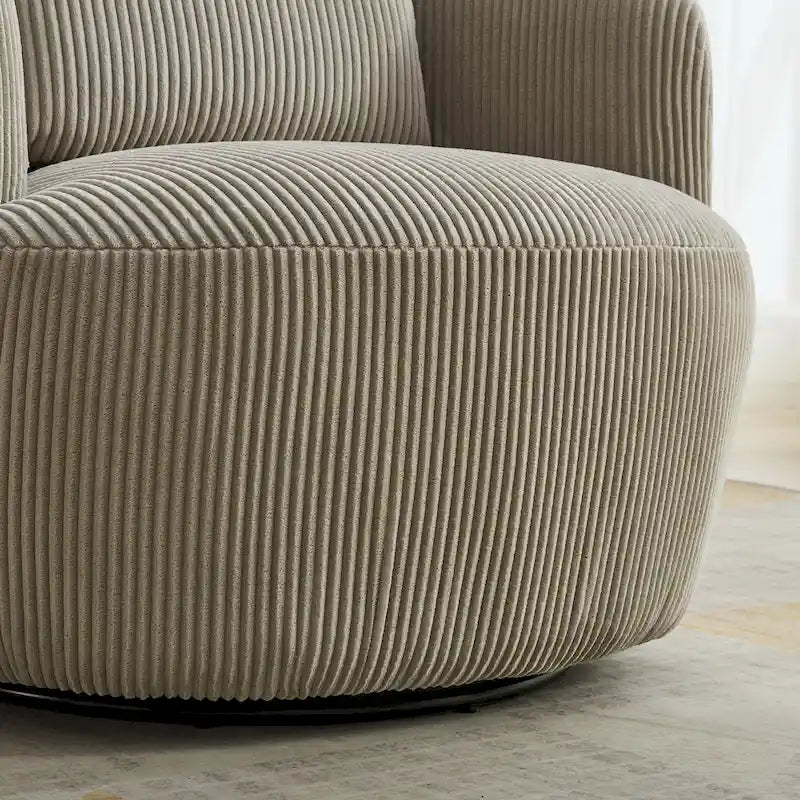 Fauteuil pivotant en velours côtelé