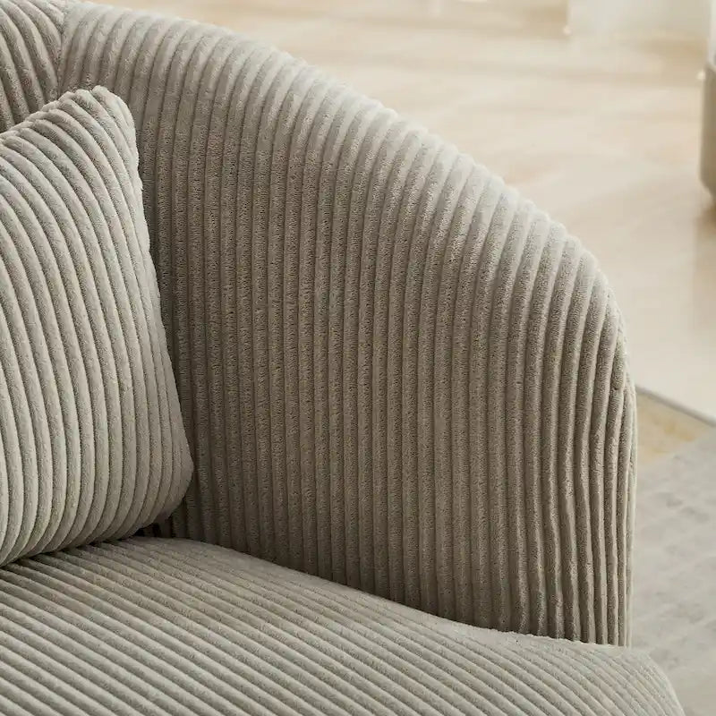 Fauteuil pivotant en velours côtelé