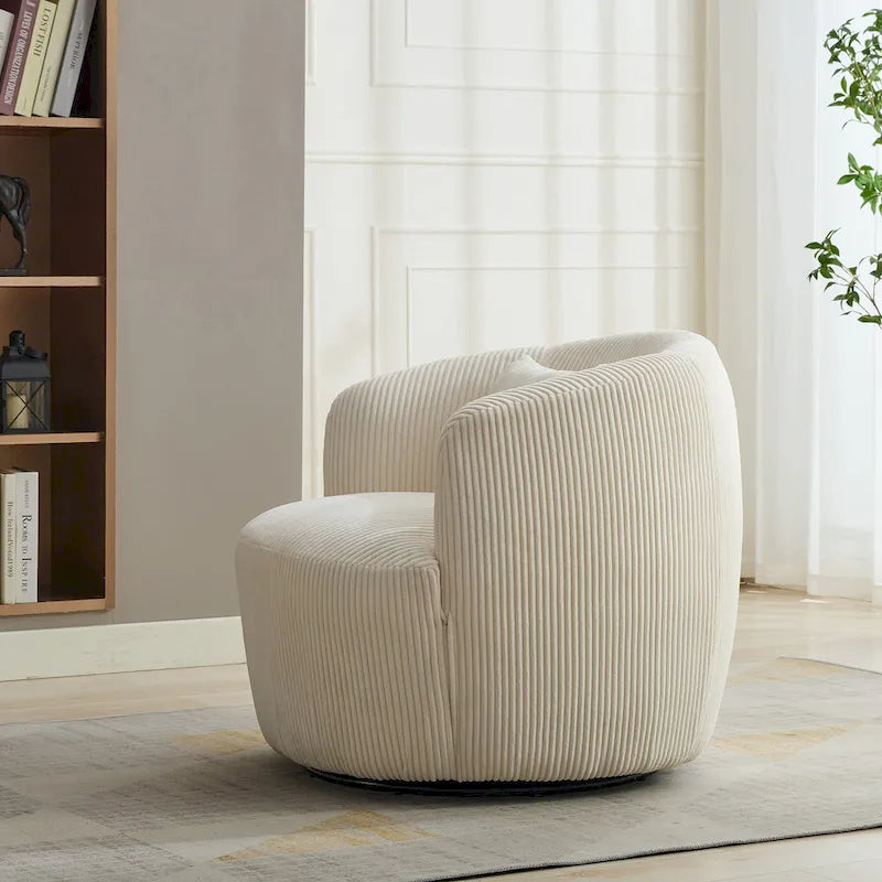 Fauteuil pivotant en velours côtelé