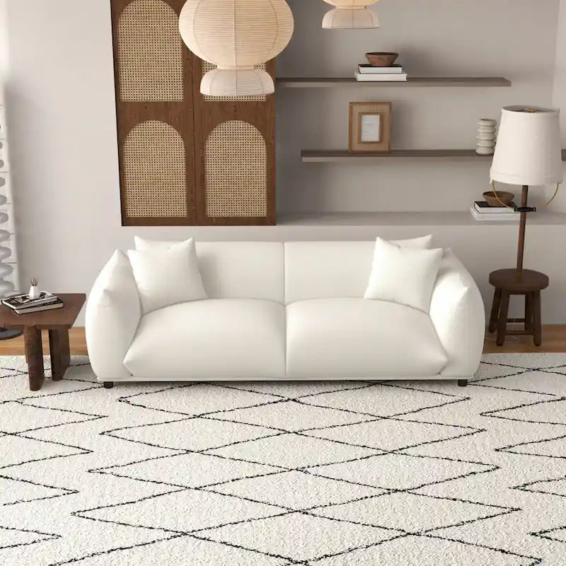 Canapé Mansan de luxe style Mid-Century Modern, dossier à coussins fermes, boucle française couleur crème
