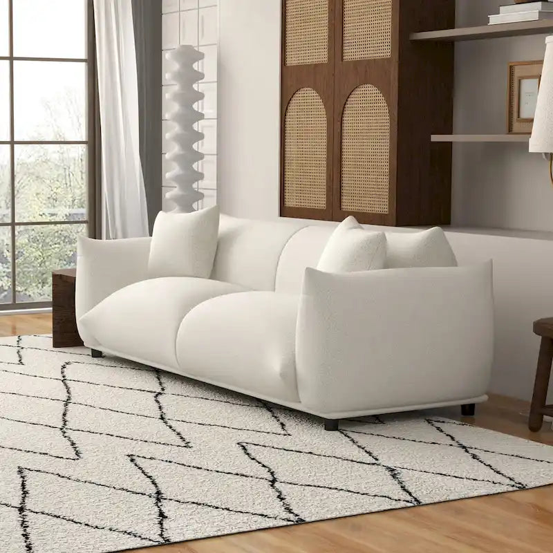 Canapé Mansan de luxe style Mid-Century Modern, dossier à coussins fermes, boucle française couleur crème