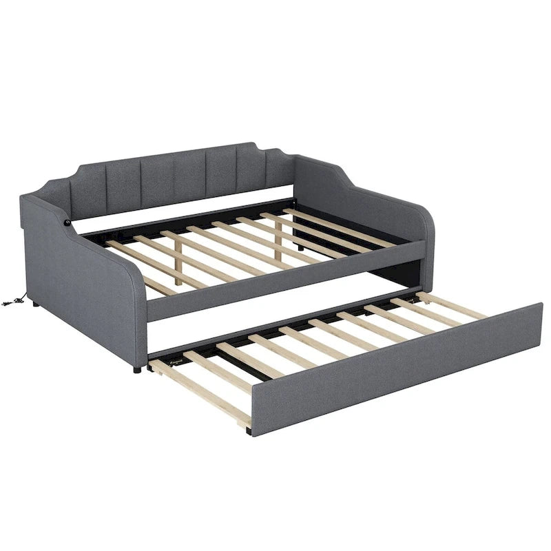 Lit de jour rembourré pleine grandeur avec lit gigogne et port de chargement USB. Le lit gigogne peut être déplié ou replié.