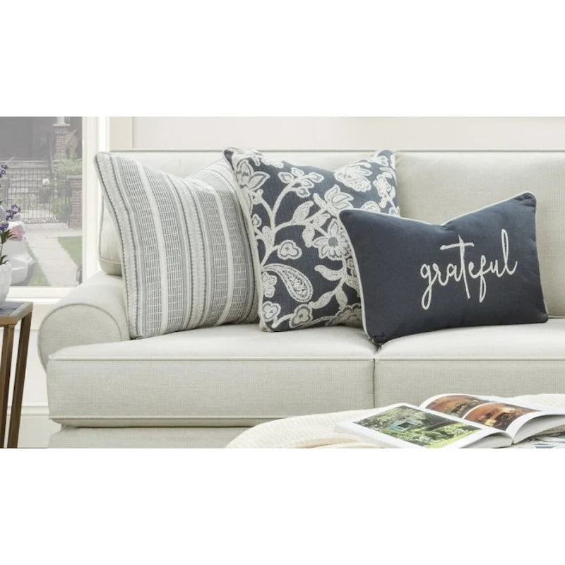 Superbe canapé fixe à accoudoirs arrondis couleur avoine