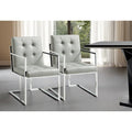 Ensemble de deux chaises de salle à manger HomeRoots capitonnées en similicuir gris clair et argent métallisé
