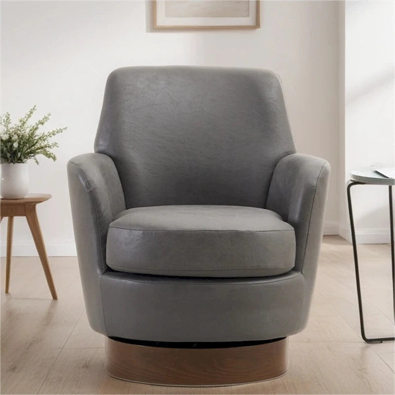 Fauteuil pivotant rond avec piètement en acier inoxydable