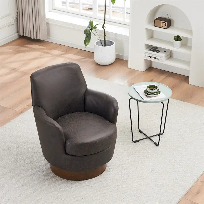Fauteuil pivotant rond avec piètement en acier inoxydable