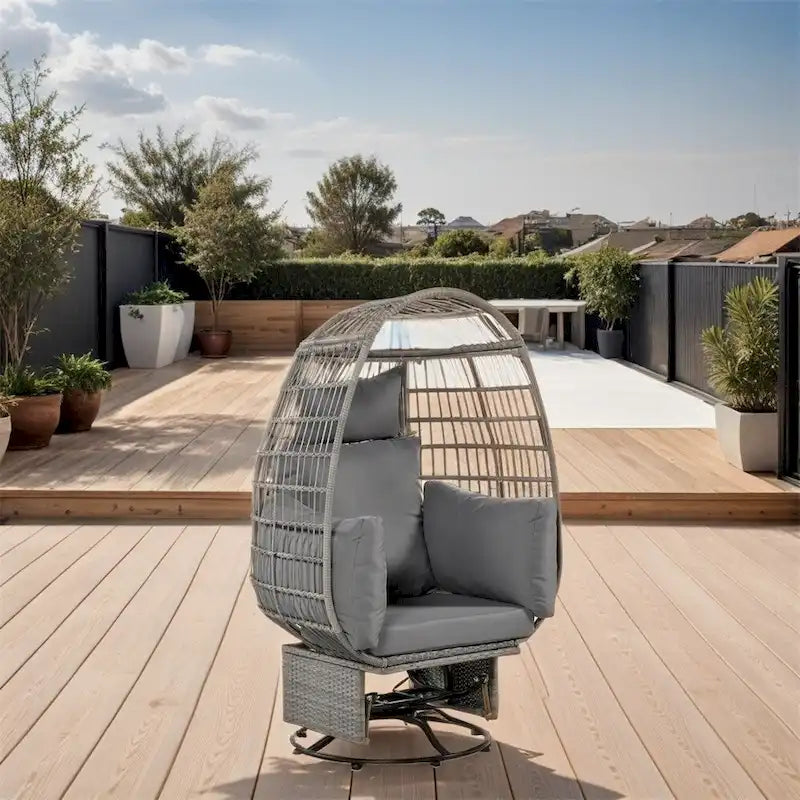 Fauteuil de jardin pivotant en rotin en forme d'œuf avec fonction bascule et coussins