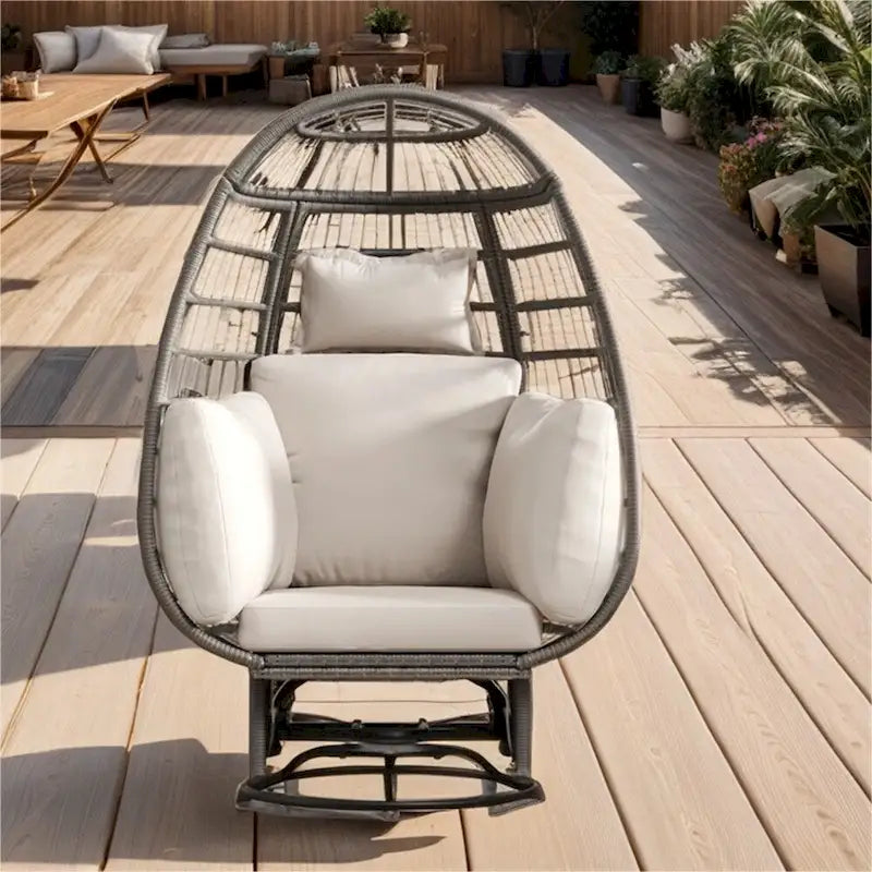 Fauteuil de jardin pivotant en rotin en forme d'œuf avec fonction bascule et coussins