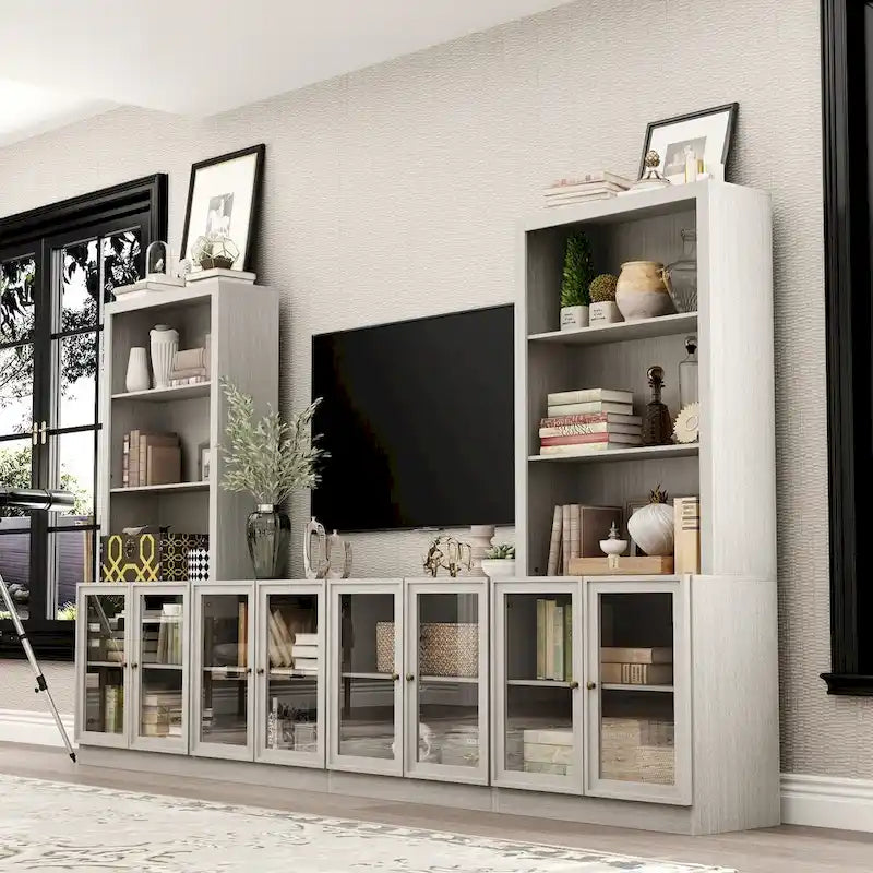 Meuble multimédia à domicile au design élégant, avec de nombreuses étagères et des accents de verre.