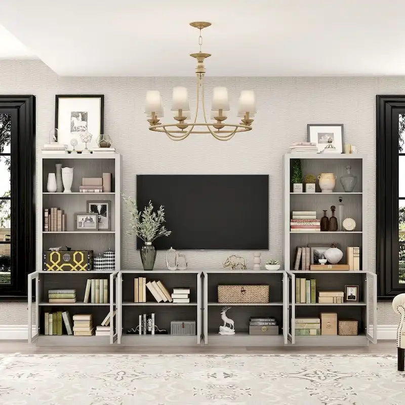 Meuble multimédia à domicile au design élégant, avec de nombreuses étagères et des accents de verre.