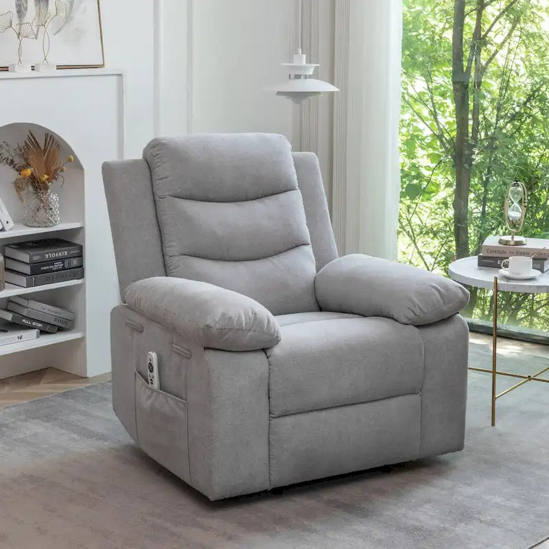 Fauteuil inclinable électrique ergonomique en velours gris clair, avec fonction chauffante et massante, structure en acier.