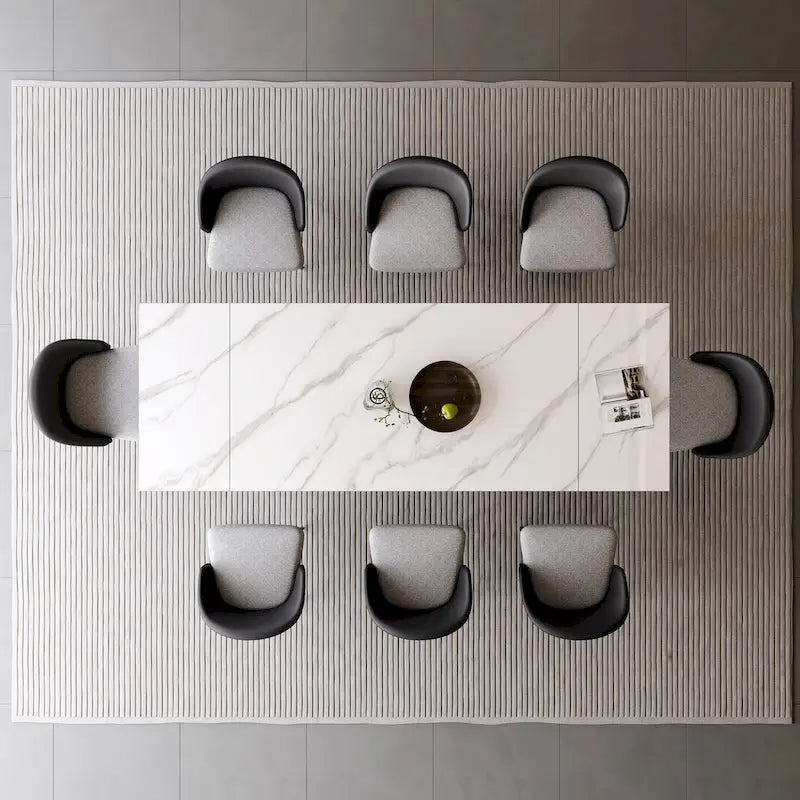 Ensemble de salle à manger 9 pièces comprenant une table rectangulaire extensible en pierre frittée (94,48 cm) et 8 chaises en similicuir.