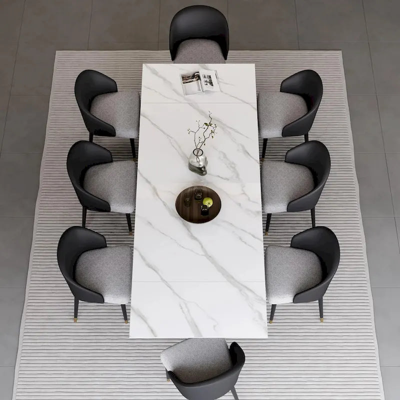 Ensemble de salle à manger 9 pièces comprenant une table rectangulaire extensible en pierre frittée (94,48 cm) et 8 chaises en similicuir.